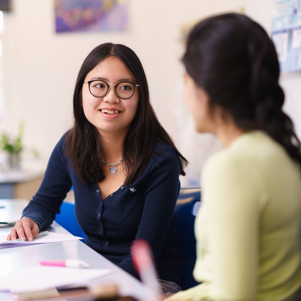 Students conversing in class