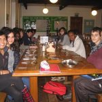 students sat at a table waiting to be served