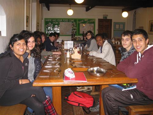 students sat at a table waiting to be served