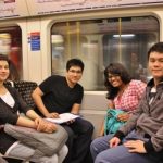 students sat on the tube