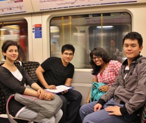 students sat on the tube