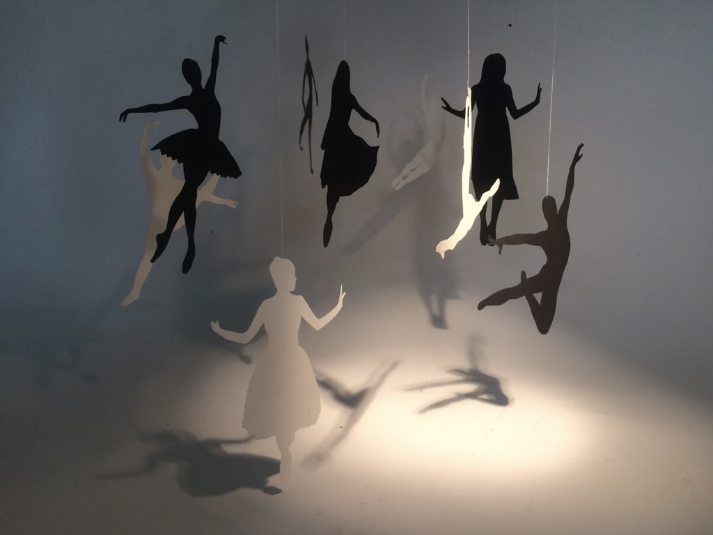 cut outs of dancers