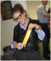 girl holding a yellow object