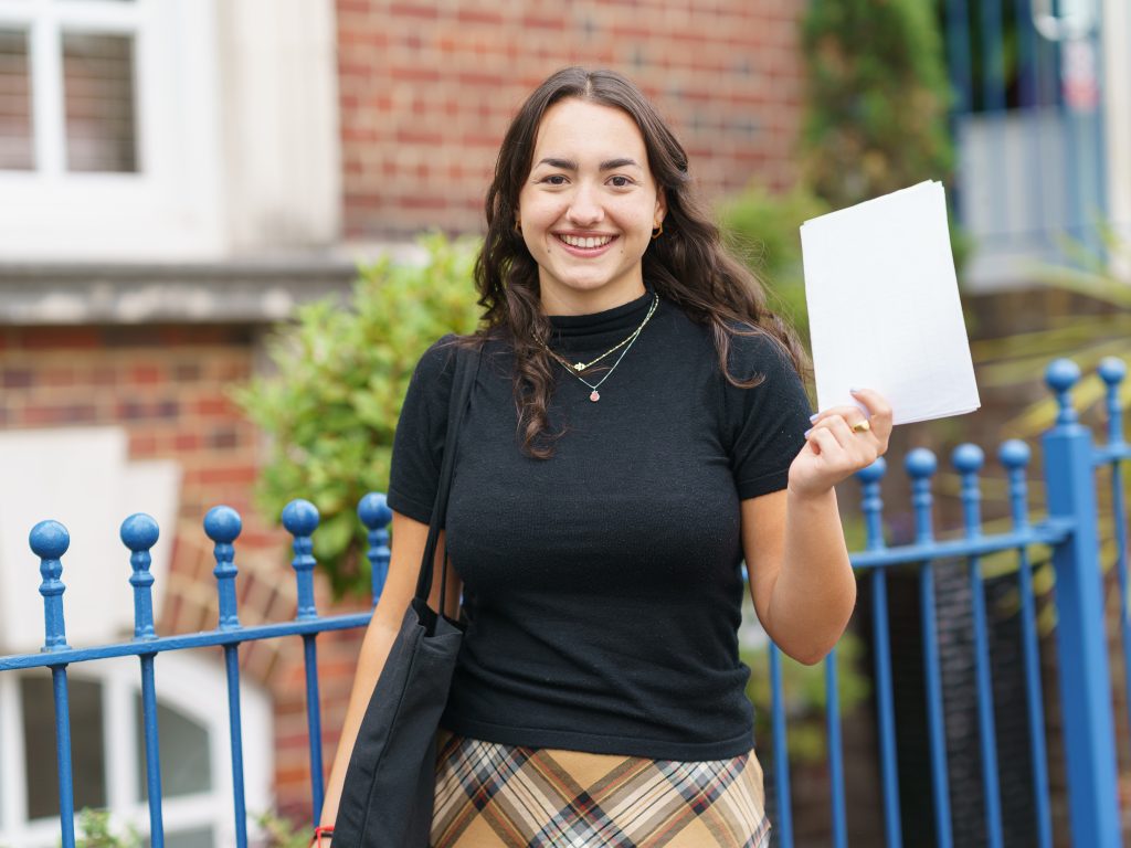 girl happy about her exam results