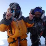 two people in snow gear