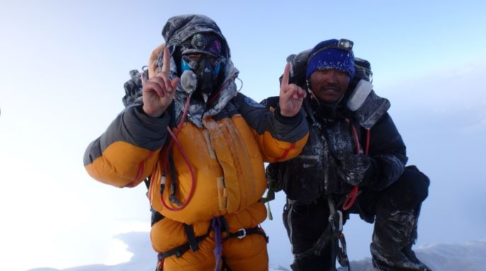 two people in snow gear