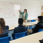 pupil delivering a presentation to her class