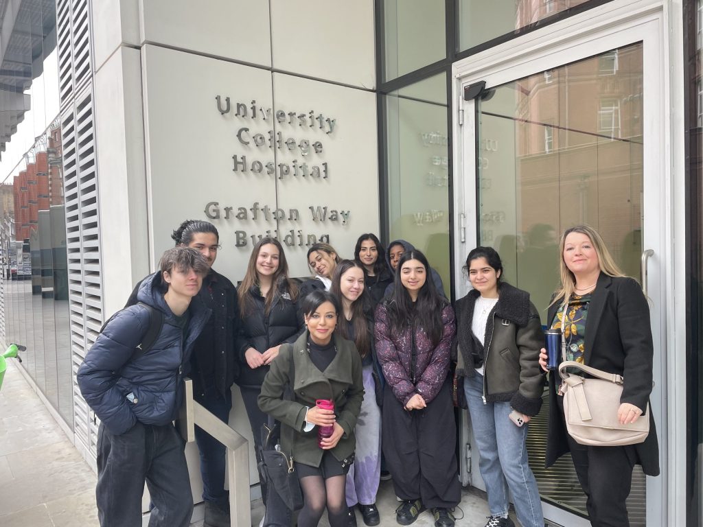 students standing outside a hospital