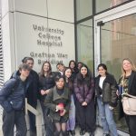 students standing outside a hospital