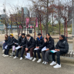 students on a bench