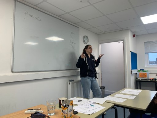 teacher talking in the class