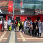 students outside a stadium