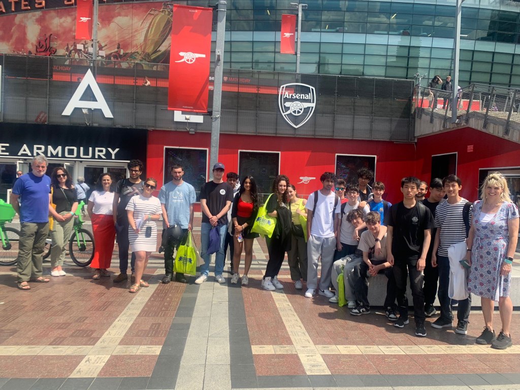 students outside a stadium
