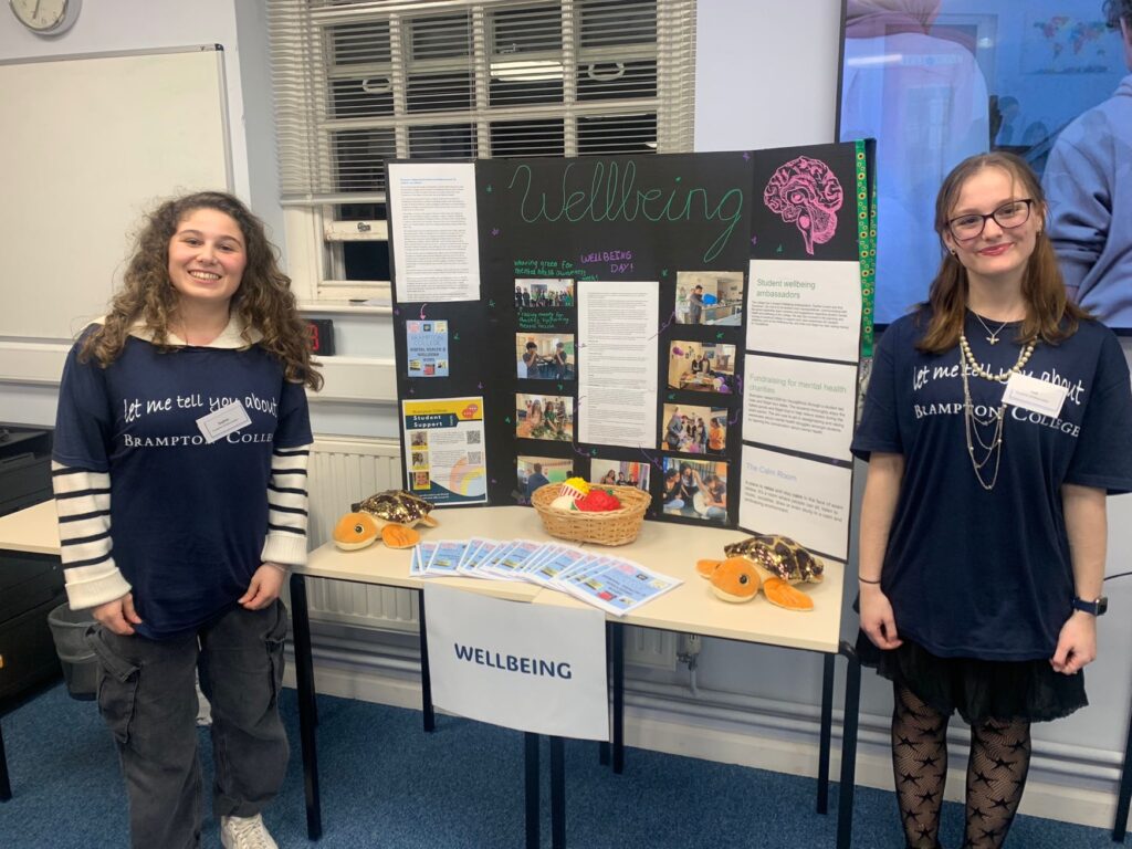 students by a wellbeing table