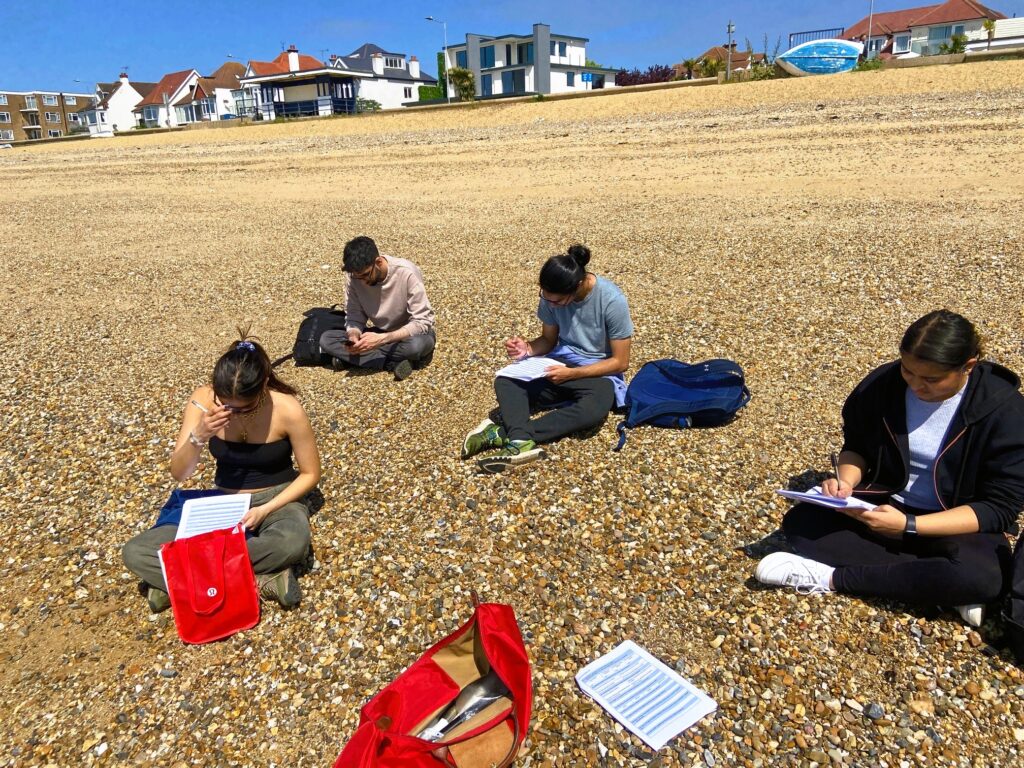 students on a beach