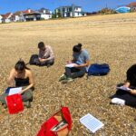 students on a beach